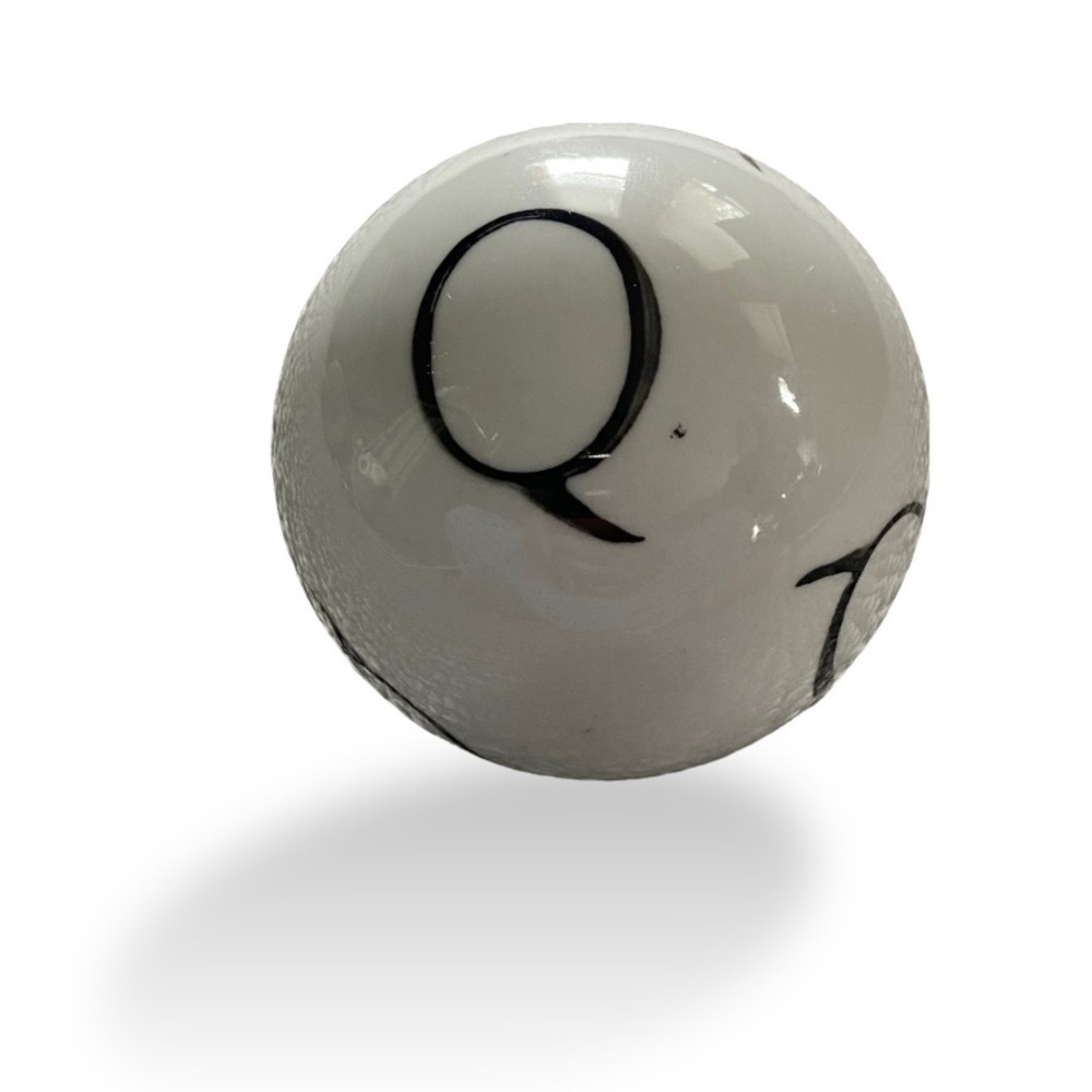 Ceramic ball with Q’s